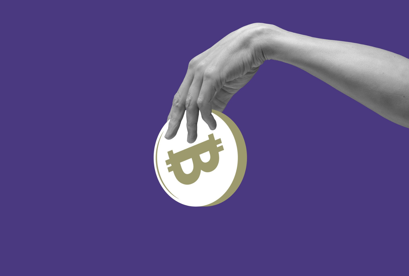hand-grabbing-bitcoin